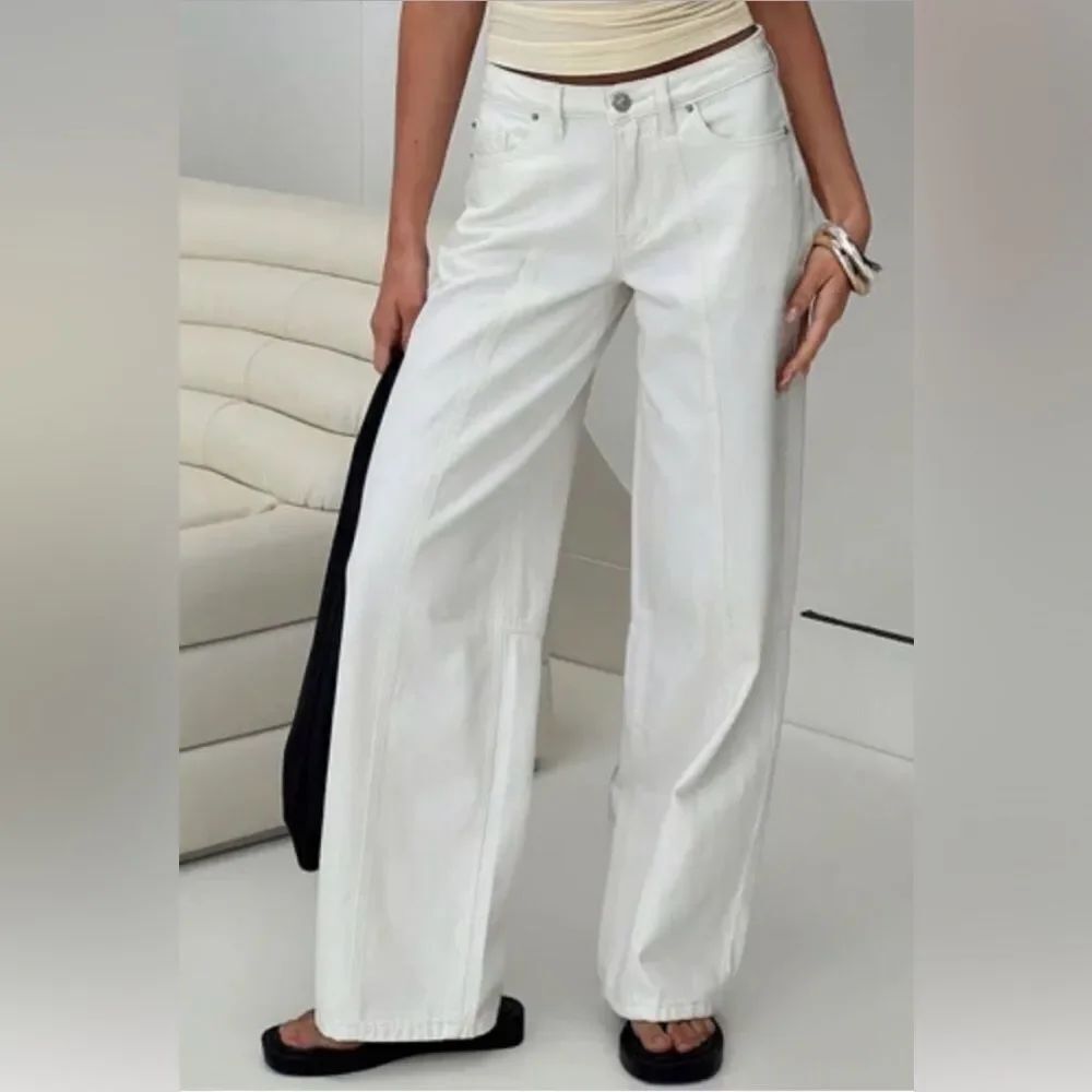 NWT Princess Polly women’s asymmetrical straight leg white . Button fly. Sz 0